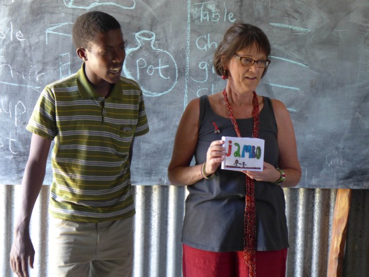 Telling the Maasai children about the artwork