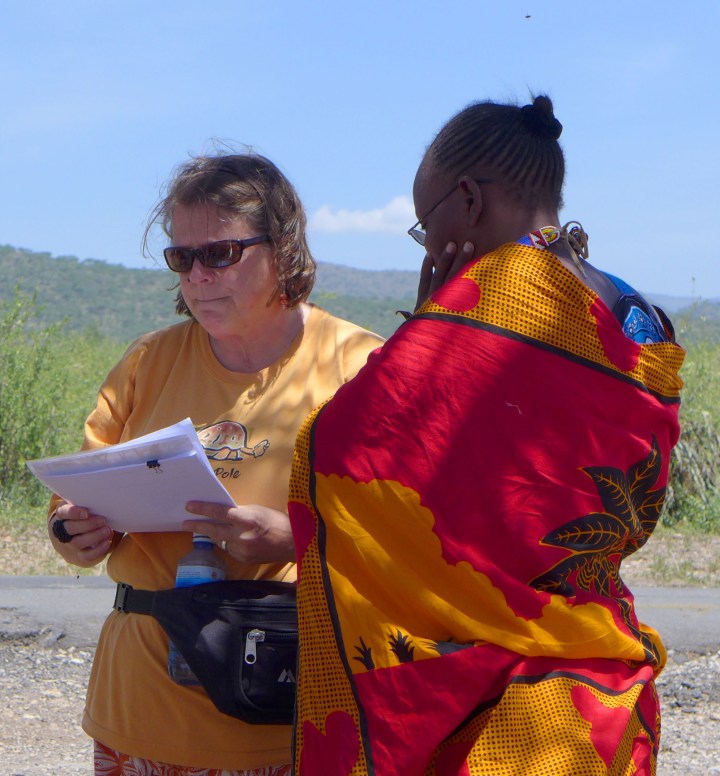 Presenting the Tuko Pamoja certificate to PCDA