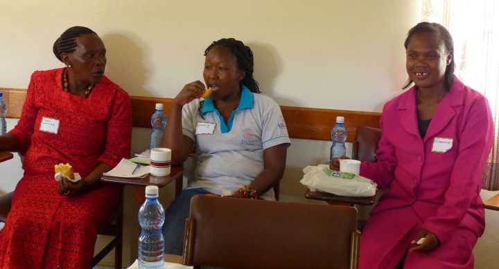 Enjoying tea and mandazis