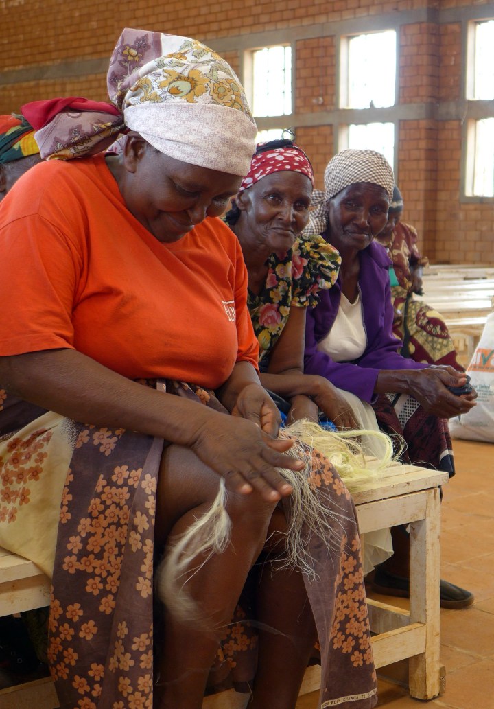 Rolling the sisel on her knee