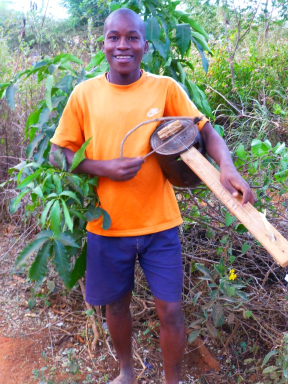 Joseph and his homemade guitar