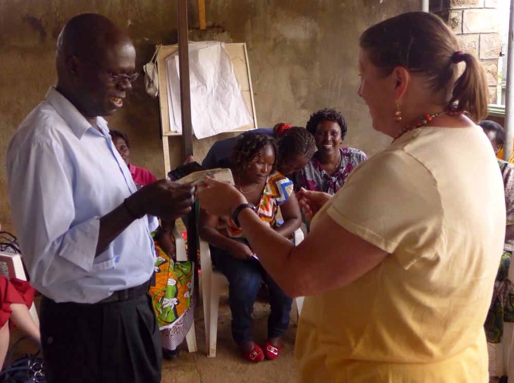A bonus for Simon Wasike, the administrator for the self help groups at Lea Toto