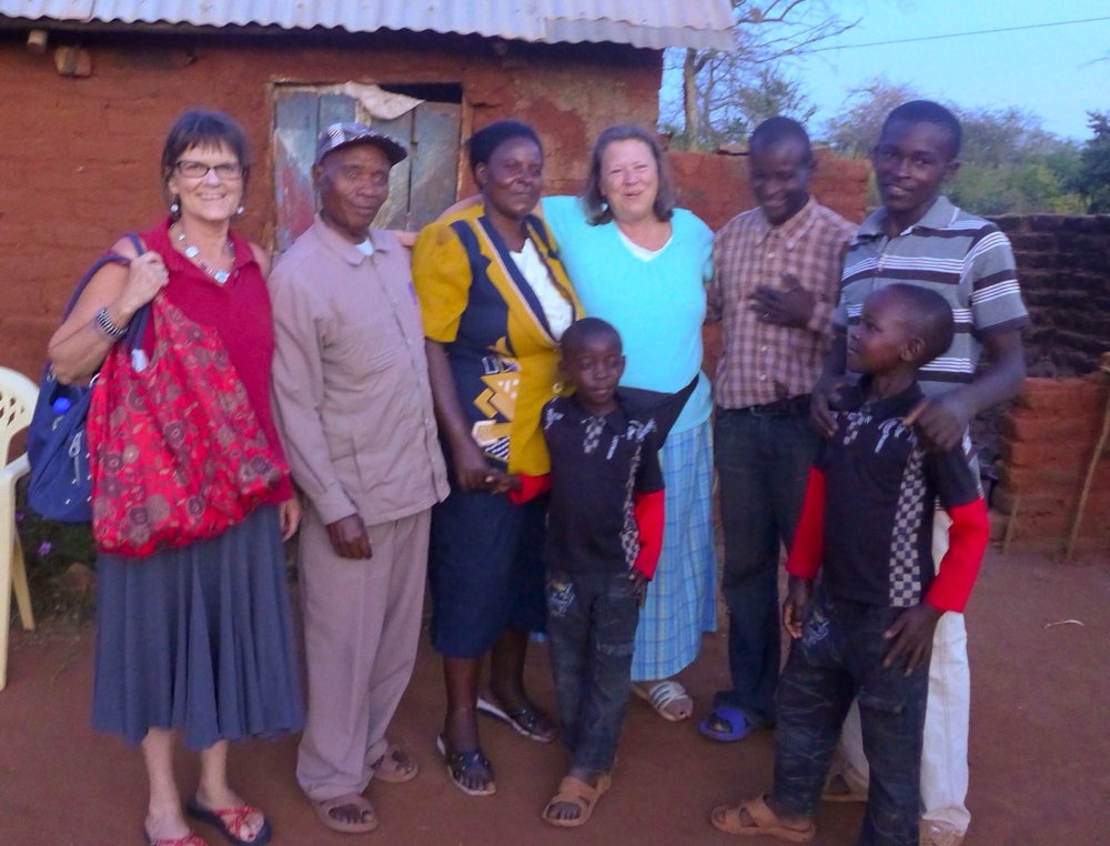 Lloydie and I with Albanus and his family