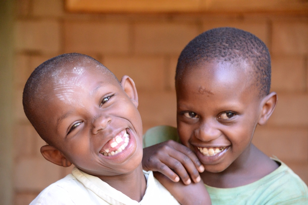 Wonderful smiles from two Village children