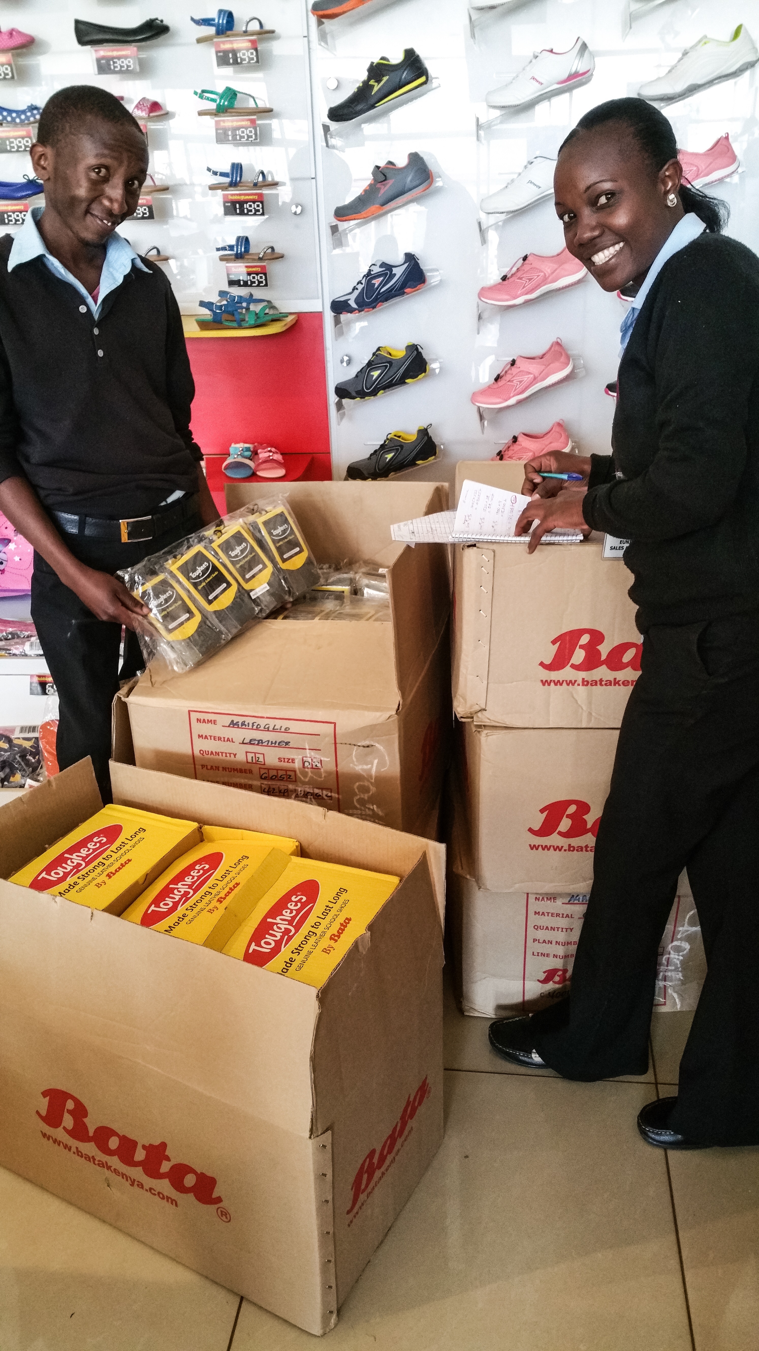 James and Eunice who helped us buy 91 pairs of shoes and socks.  They received a very nice tip!